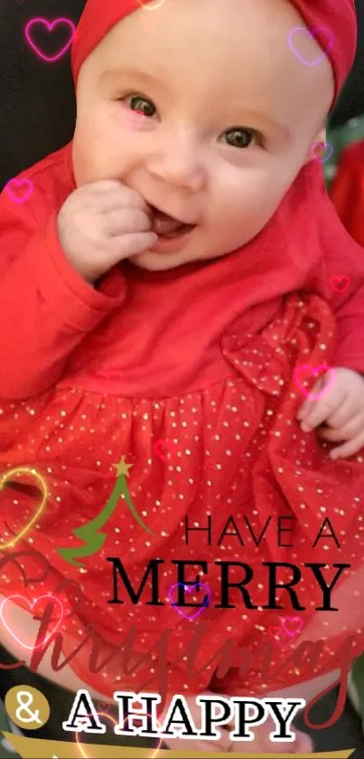 Cute baby in red Christmas outfit with festive greetings.