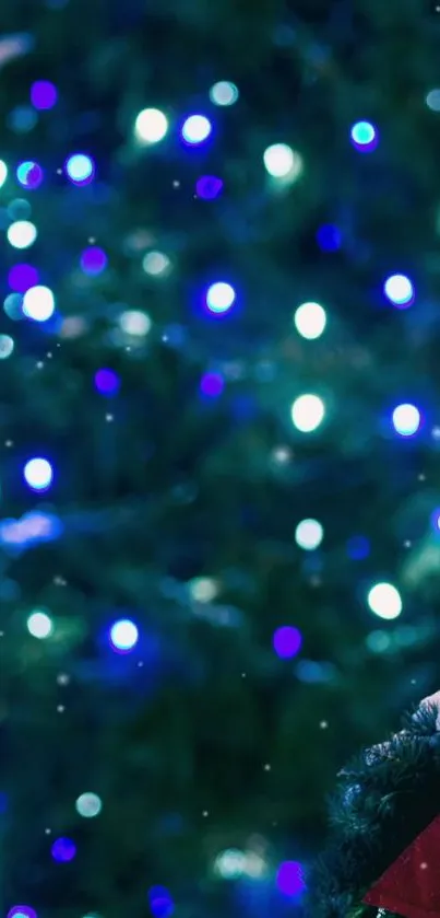 Festive bokeh lights in blue hues on a dark green background with holiday decor.