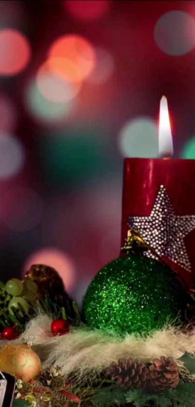 Red candle and Christmas ornaments with bokeh lights.