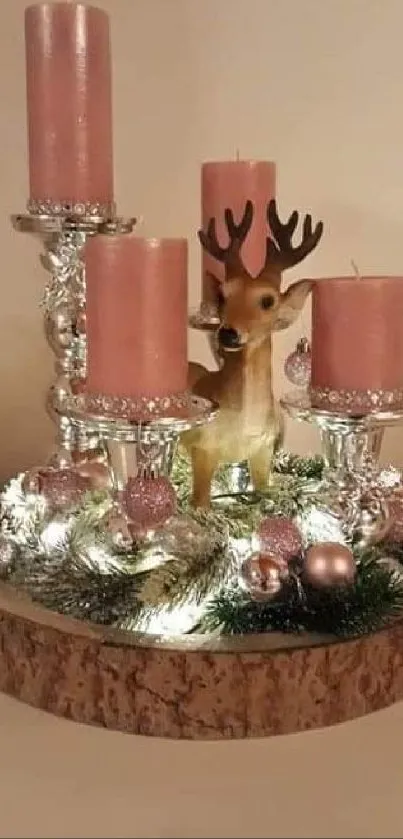 Festive centerpiece with pink candles and reindeer.