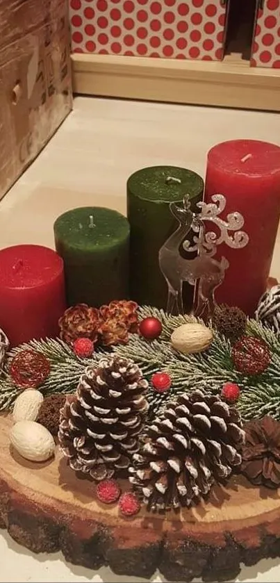 Festive candle arrangement with pine cones and holiday decorations.