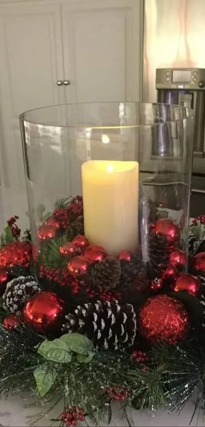 Festive holiday centerpiece with candle, red accents, and pine wreath.