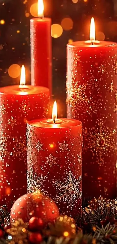 Red festive candles glowing warmly with decorative accents.