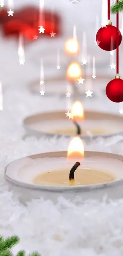 Festive wallpaper with candles, red ornaments, and pine greenery.