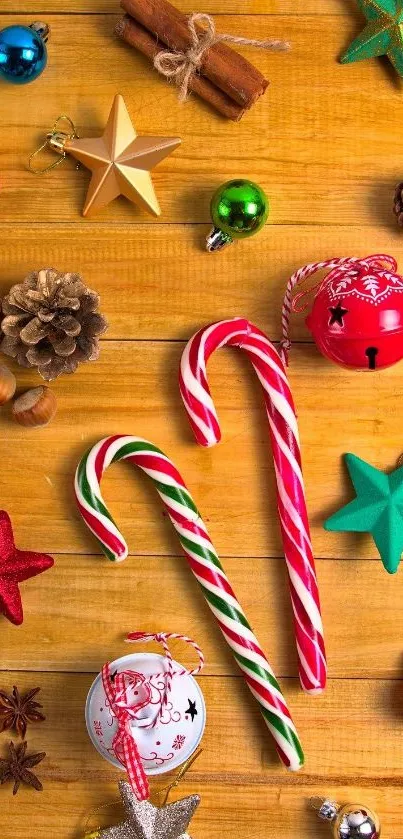 Festive candy cane wallpaper with ornaments on a wooden background.