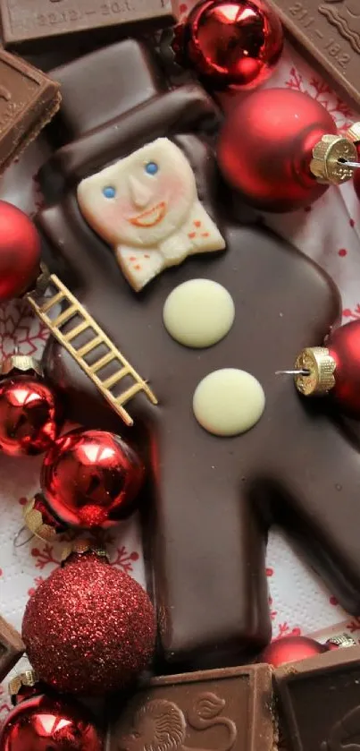 Festive gingerbread man with chocolate tiles and red ornaments.