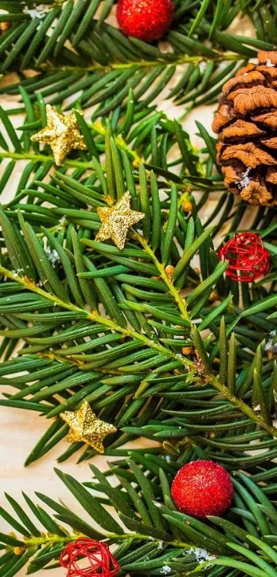 Festive Christmas branch with pine, berries, and gold stars wallpaper.