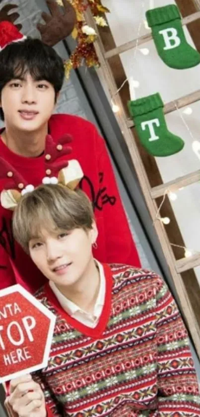 Festive BTS members in Christmas sweaters with decorations.