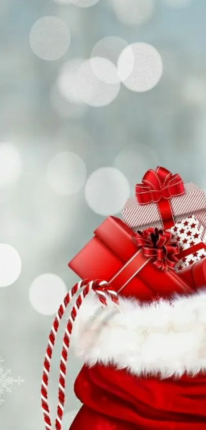 Red Christmas gifts in a festive stocking with a snowy background.