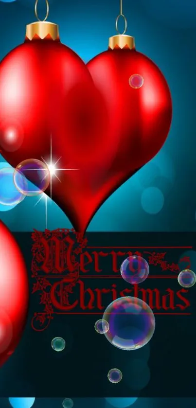 Red heart ornaments on blue background with Christmas text.