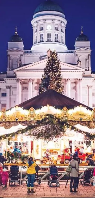 Vibrant Christmas market with cathedral at night.