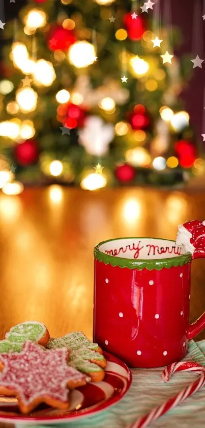 Cozy red mug and cookies with glowing Christmas tree in background.