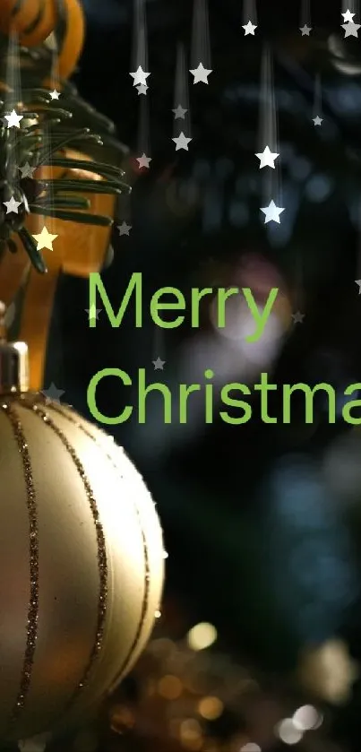 Mobile wallpaper with a golden Christmas ornament hanging on a tree.