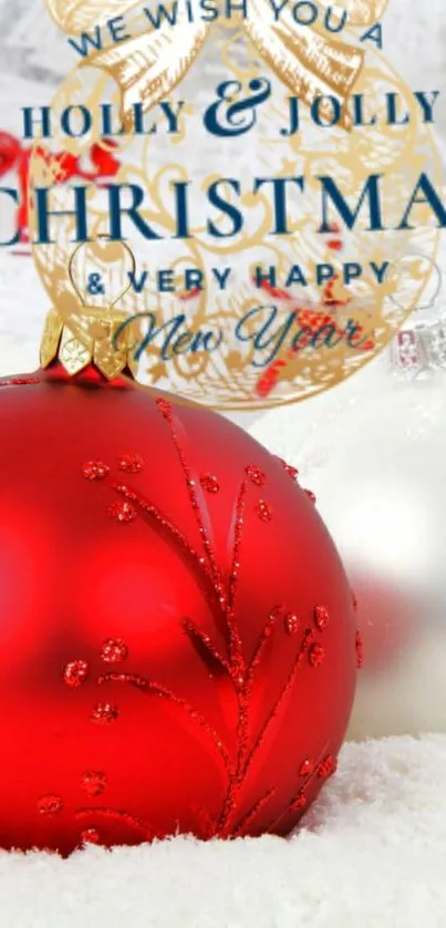 Red Christmas ornament on snowy background with greeting text.