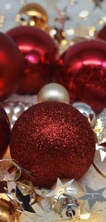 Festive red and gold Christmas ornaments with lights.