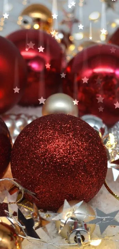 Festive red Christmas ornaments with lights on fluffy snow.