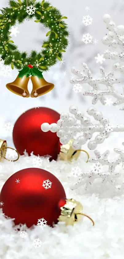 Christmas wallpaper with red ornaments, green wreath, and snowy branches.