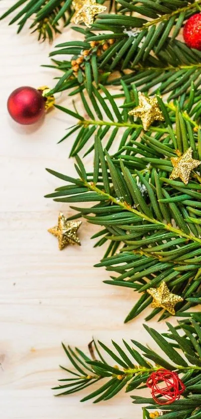 Festive Christmas wallpaper with pine branches and decorations.