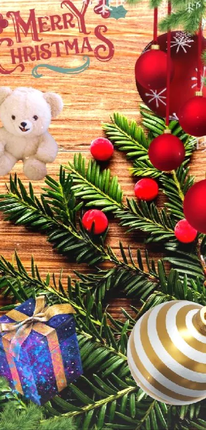 Festive Christmas decorations on wooden background with greenery and holiday card.