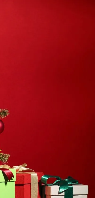 Festive red wallpaper with Christmas tree and gifts.