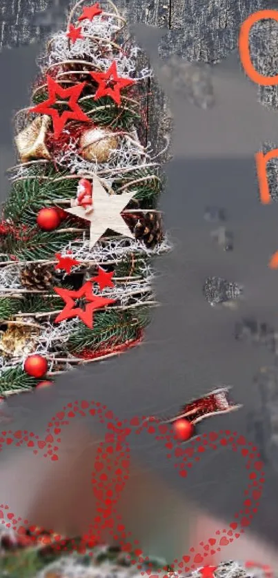 Festive Christmas tree with red stars and pine cones on gray background.