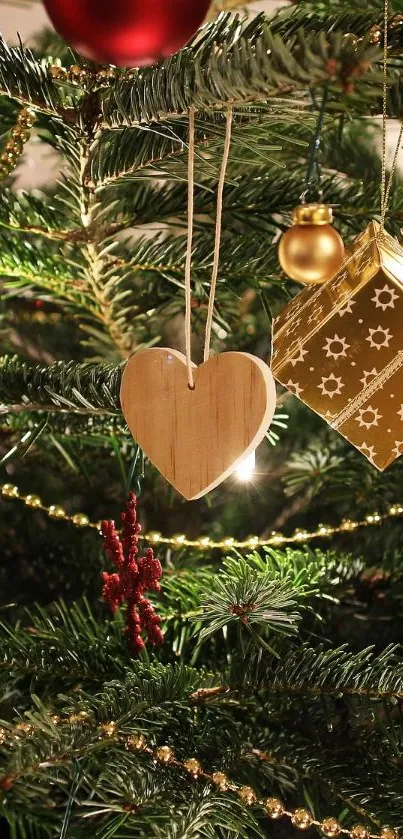 Christmas tree with heart-shaped ornament and lights.