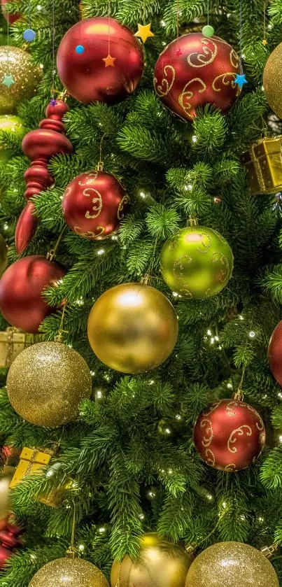 Festive Christmas tree with colorful ornaments and lush green branches.