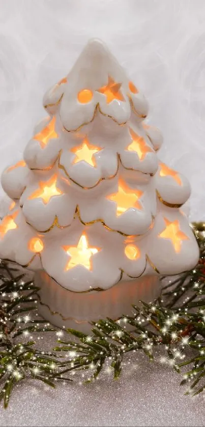 Festive Christmas tree with ornaments and glowing lights on pine branches.