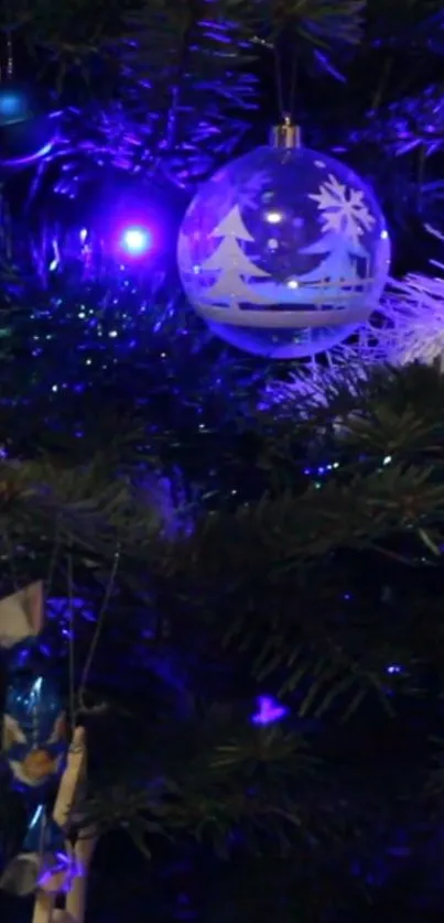 Christmas tree with purple glowing lights and ornaments.