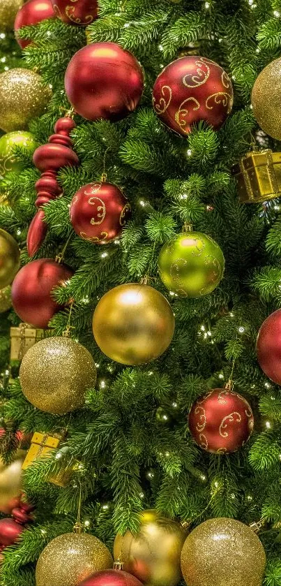 Vibrant Christmas tree with red and gold ornaments in festive arrangement.