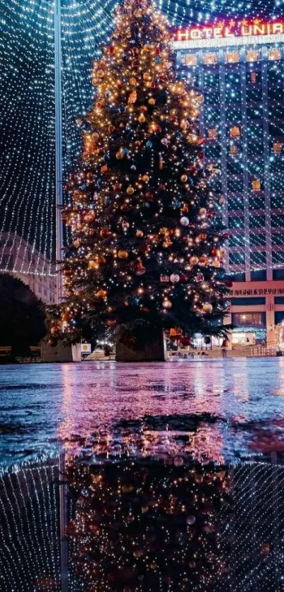 Christmas tree with festive lights reflecting on wet pavement.