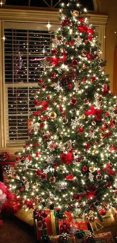 Cozy Christmas tree with lights, ornaments, and presents in a warm room.
