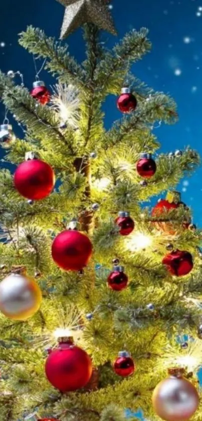 Festive Christmas tree with lights and ornaments against a starry night backdrop.