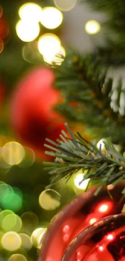 Festive Christmas tree with red ornaments and glowing lights.