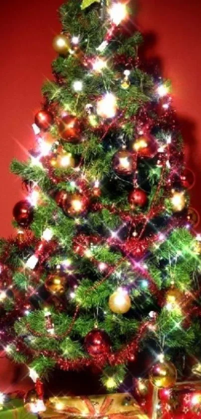 Vibrant Christmas tree with lights and gifts against a red backdrop.