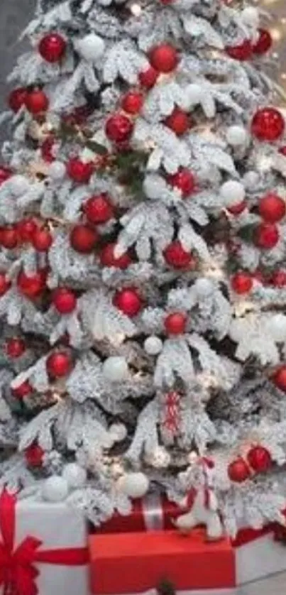 Festive Christmas tree with gifts and white snow.