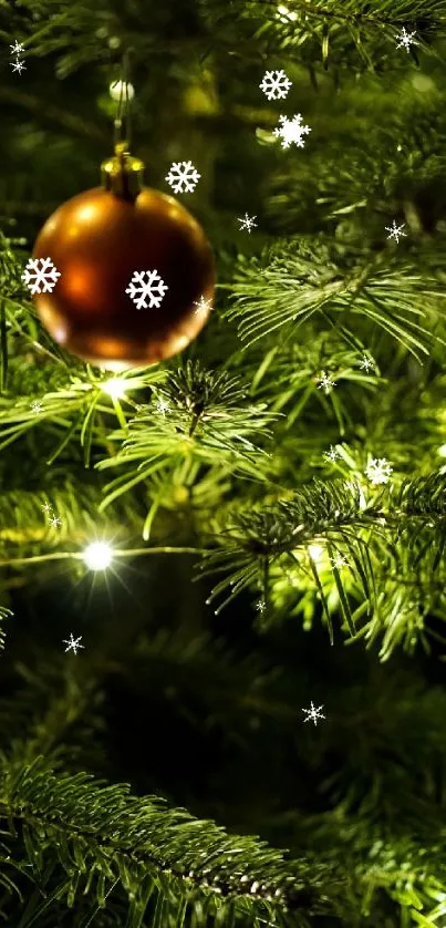 Festive Christmas tree with a golden ornament and glowing lights.