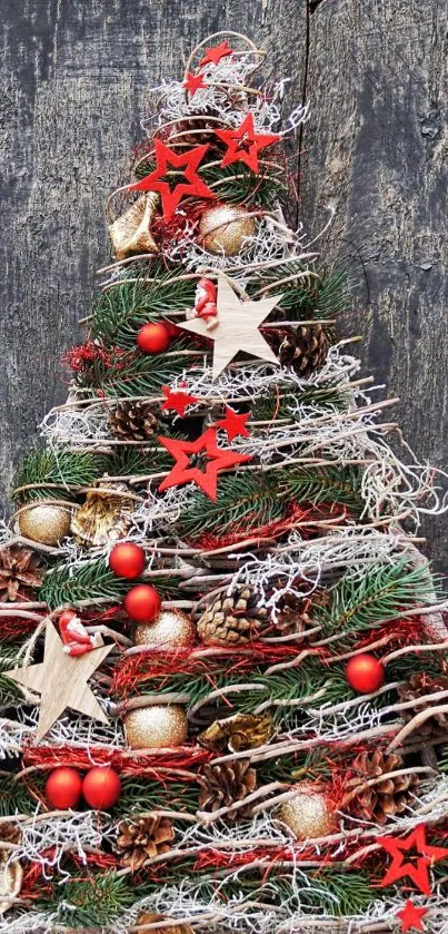 Festive Christmas tree with red stars and pine cones on mobile wallpaper.