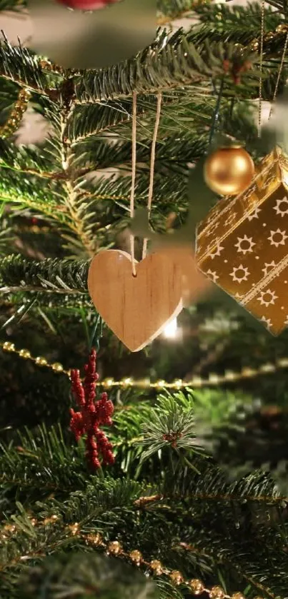 Festive Christmas tree with golden ornaments and decorations.