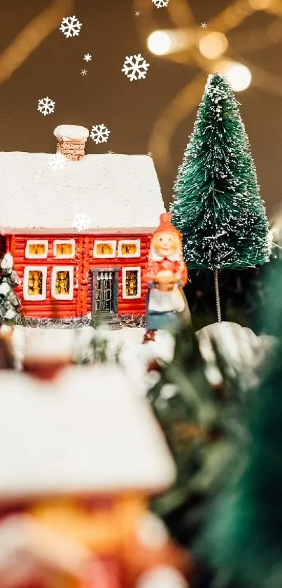 Miniature Christmas village with fairy lights and snowy trees.