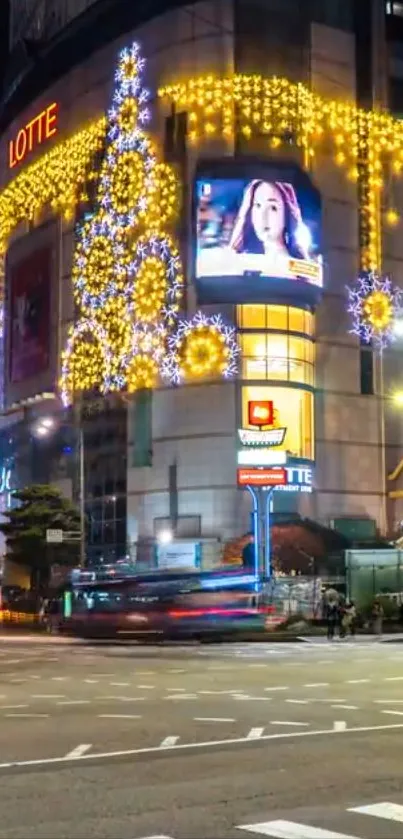 Vibrant city street with festive holiday lights at night.