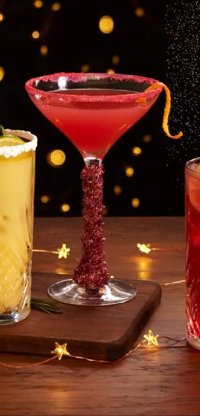 Vibrant cocktails with festive lights on a wooden table.