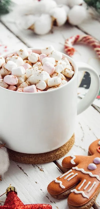 Cup of hot chocolate with marshmallows and gingerbread on a festive table.