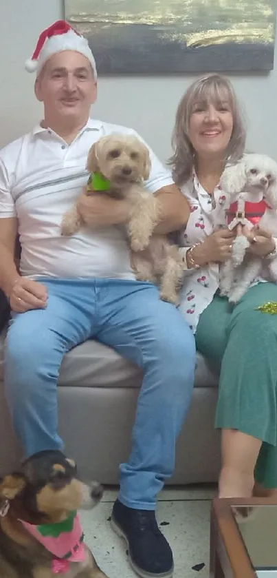 Family with pets celebrating Christmas in festive living room.