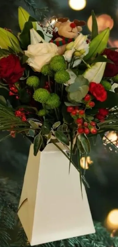 Festive bouquet of roses with greenery against glowing light backdrop.