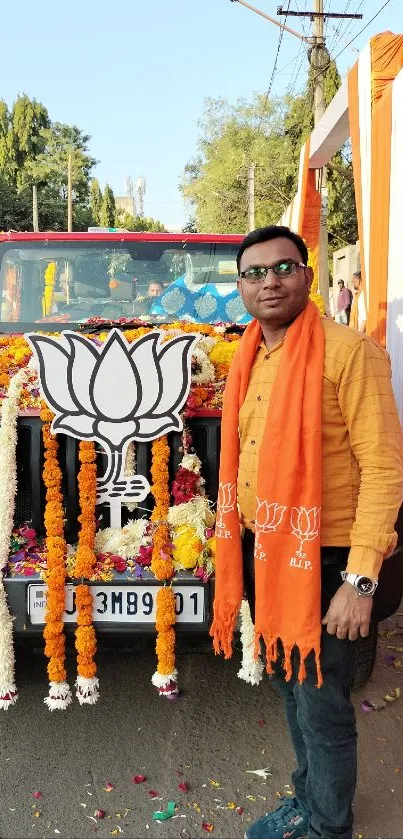 Festive car with marigold garland and orange decorations in India.