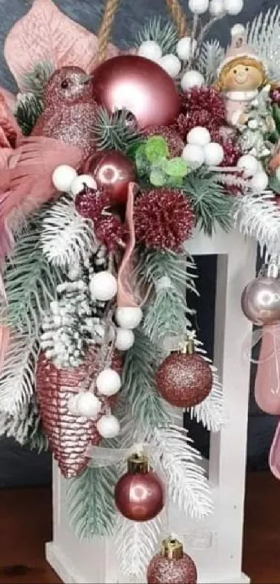 Festive floral holiday decor with pink and white accents on a dark gray background.