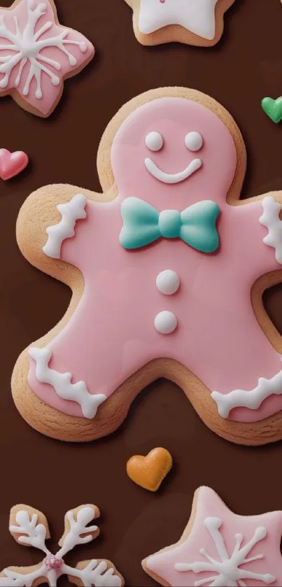 Pink gingerbread cookie with a turquoise bow on a chocolate background.