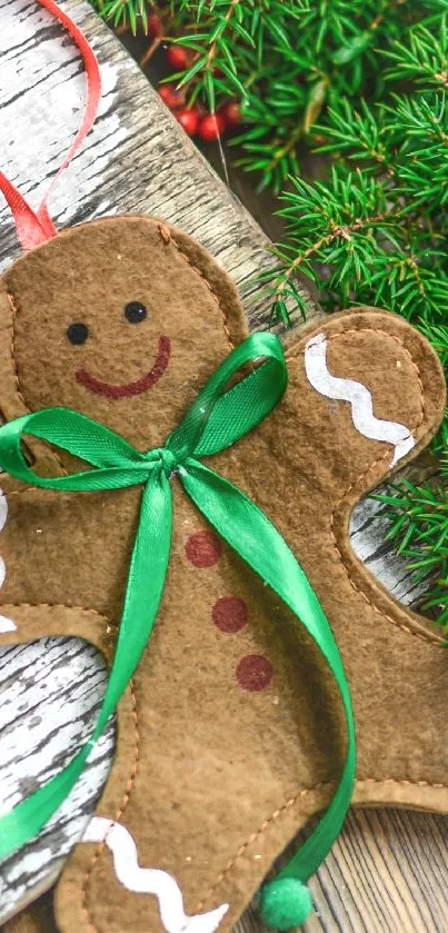 Gingerbread ornament on rustic wood with green accents.