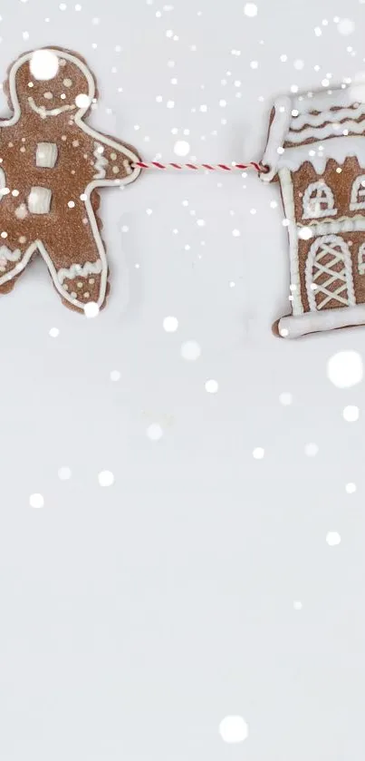 Gingerbread man and house with snowy background.